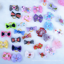 Chien Bandes de cheveux Petit Bowknot Animaux Toilettage Produits Mix Couleurs Varie Patterns Pet Hair Bows